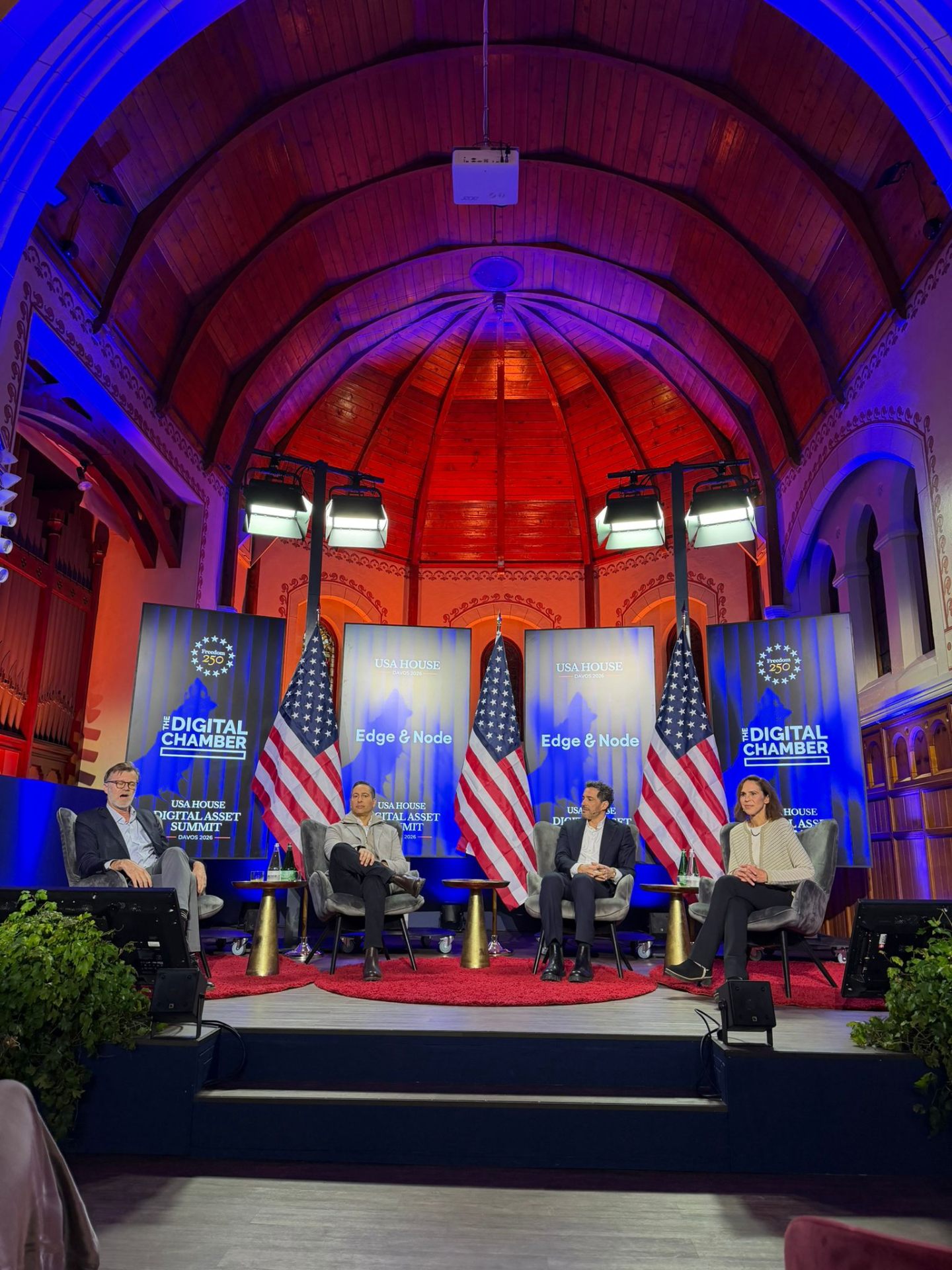 Michael Casey moderating panel at USA House Davos